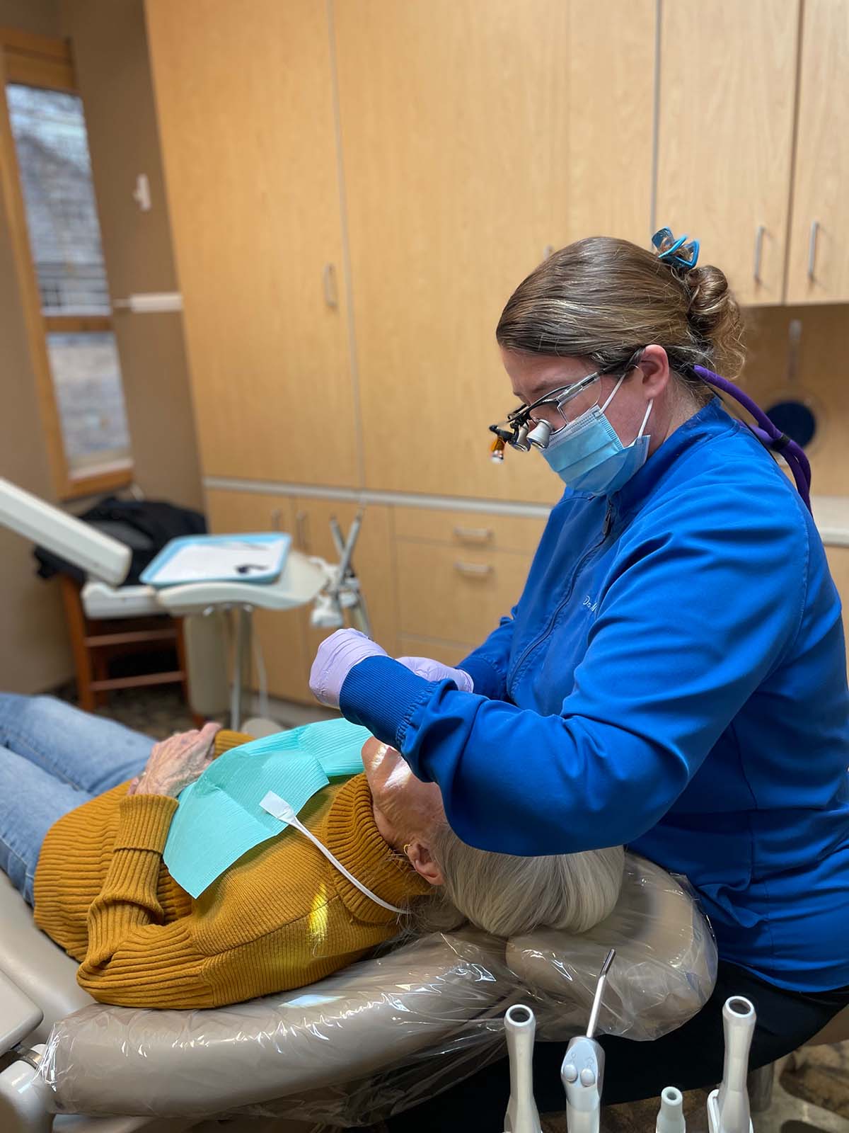 Dr Rebecca DeWolf Felices examining a patient